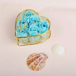 Six piece, artificial Rose and heart shaped box.